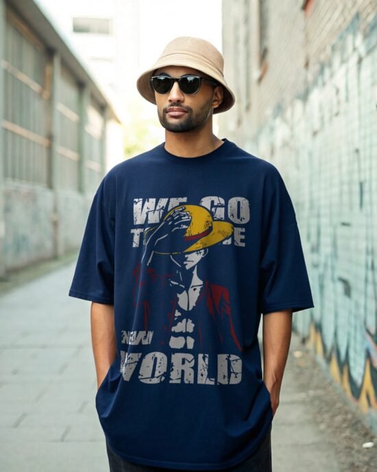 A man wearing dark navy blue oversized t-shirt in summer days outdoor back alley graffiti wall and standing straight facing camera hand in the pocket, wearing sun glass and summer hat.